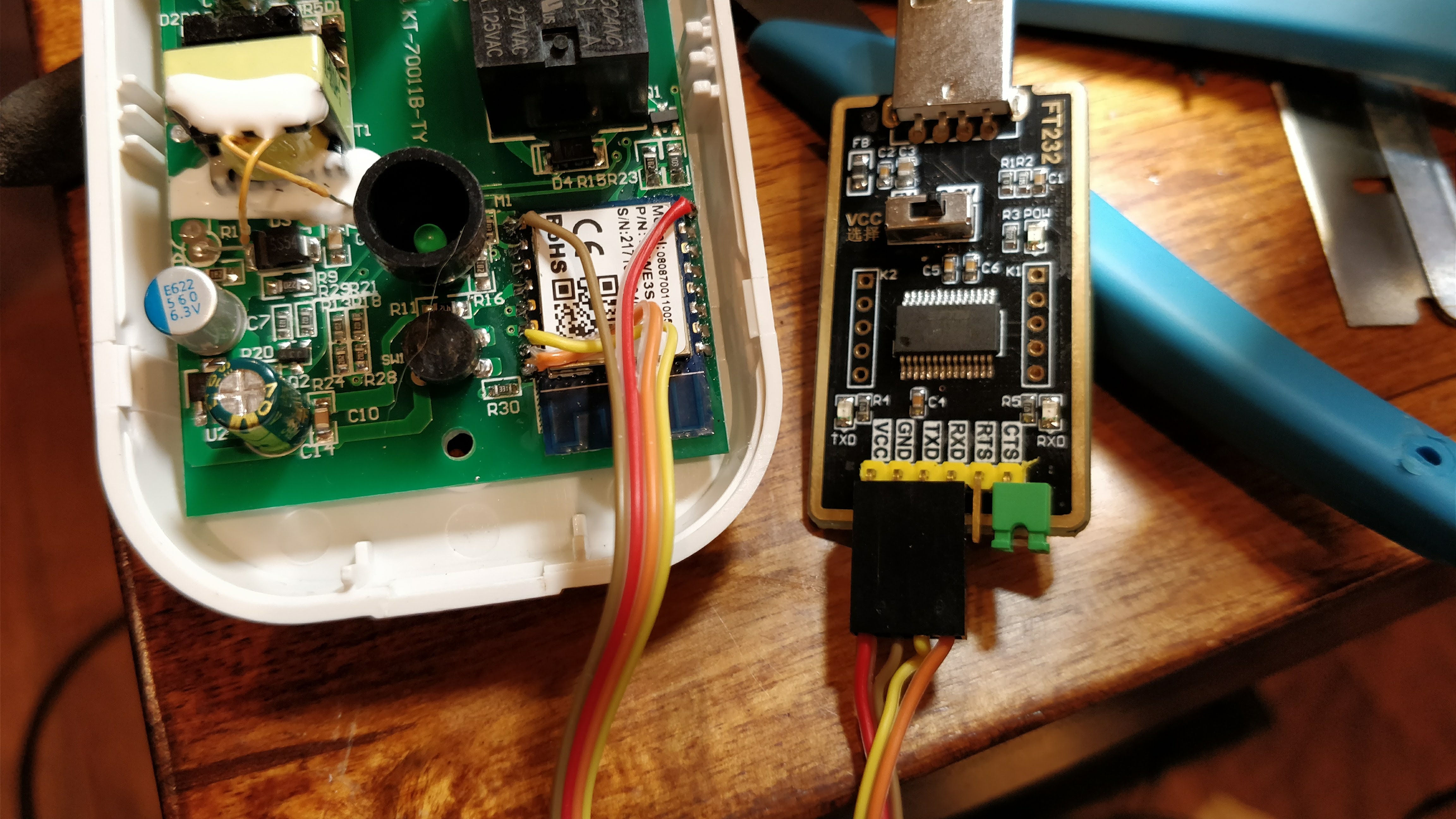 Photo of the Smart Plug connected to a serial flasher Photo of the Smart Plug connected to a serial flasher